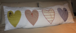 Rectangular cushion with hearts applique